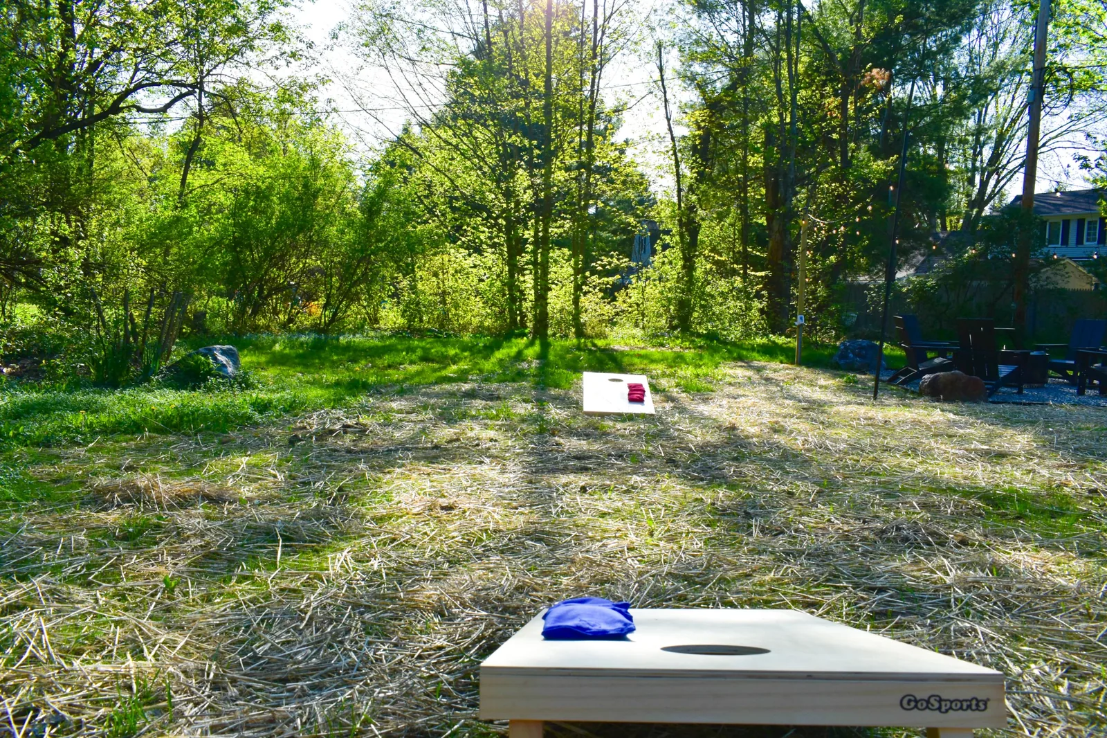Cornhole boards set up across the lawn