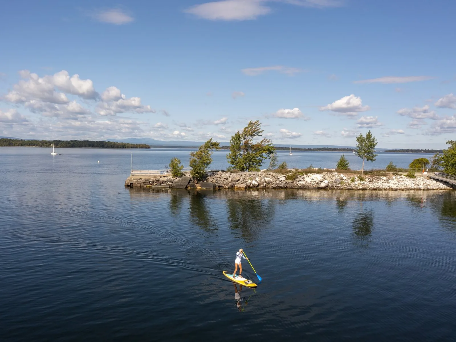 Paddleboarder on Lake Champlain, one of Vermont's many lakes